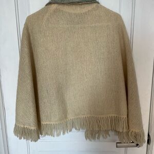 Elegant Cream Fringe Sweater